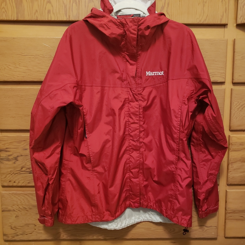 Marmot Womens Rain Jacket. Medium size.Zipper and Velcro closures.